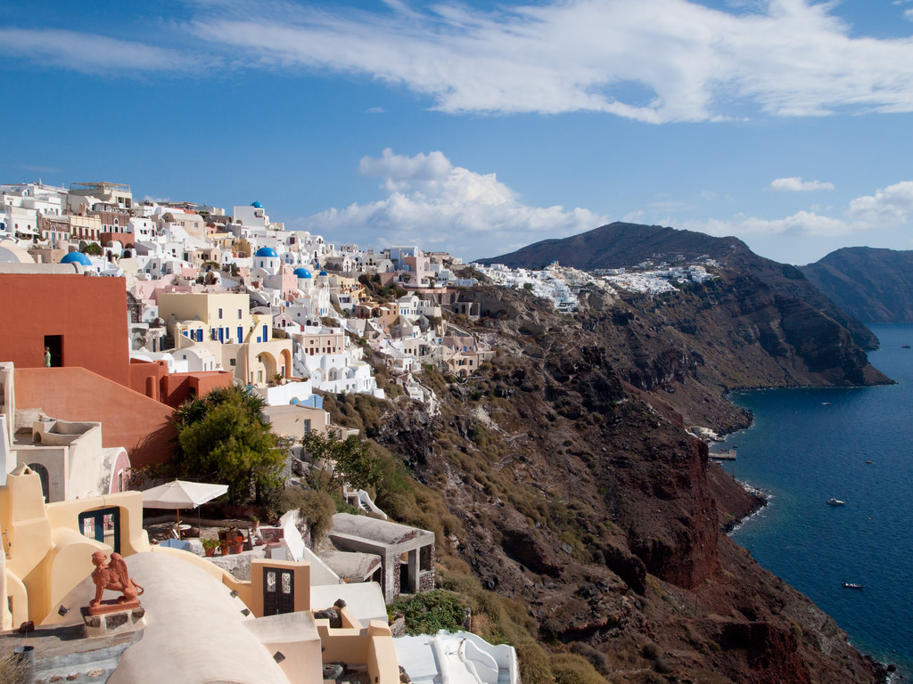 This is the village of Oia, perched on a clifftop at the end of the island of Santorini. Our cave house was near the bottom of the developed part of the hillside.